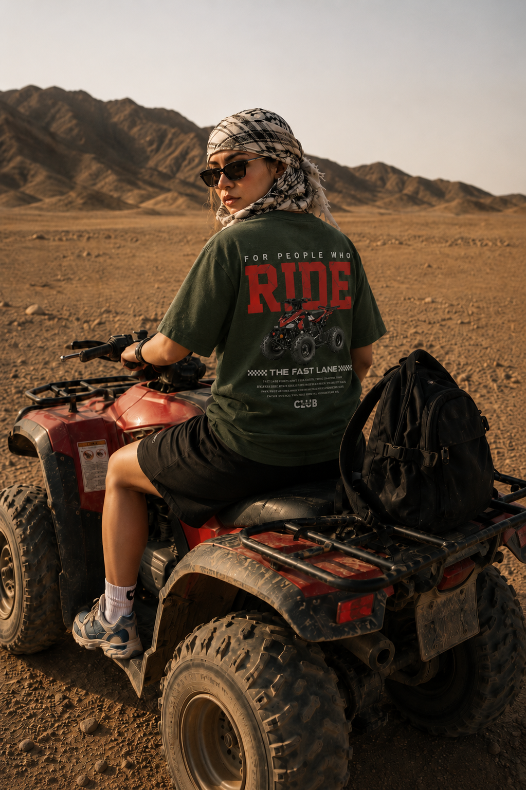 Model wearing oversized graphic tee